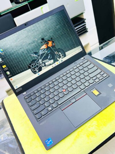 he Lenovo ThinkPad T14 Gen 2 is a powerful and reliable used business laptop designed for professionals who need performance, durability, and long-term usability at an affordable price. Part of Lenovo’s highly respected ThinkPad T-Series, this model is built to meet professional and corporate standards while offering excellent portability and efficiency. This unit is original used, carefully inspected, and comes in 10/10 neat and clean condition, making it an excellent choice for users who want premium quality without the cost of a brand-new laptop. At the core of this laptop is the Intel® Core™ i5-1145G7 (11th Generation) processor, clocked at 2.60GHz. This processor is well known for its balance of power and energy efficiency, making it ideal for office work, business software, online meetings, accounting tasks, browsing, documentation, and multitasking. Whether you are a corporate employee, freelancer, student, or remote worker, this processor delivers smooth and stable performance throughout the day. The laptop is equipped with 16GB RAM, allowing you to run multiple applications at the same time without slowdown. You can comfortably use Microsoft Office, web browsers with many tabs, PDFs, email clients, and business tools simultaneously. The 256GB SSD storage ensures fast boot times, quick application loading, and responsive overall performance. Compared to traditional hard drives, SSD storage significantly improves speed and reliability, making this used ThinkPad feel fast and modern. The 14-inch Full HD (FHD) display delivers sharp visuals, clear text, and comfortable viewing for long working hours. The screen size and resolution make it ideal for productivity tasks such as spreadsheets, documents, presentations, video calls, and everyday office use. It provides a good balance between screen space and portability, which is why the T14 series is popular among professionals. Design-wise, the Lenovo ThinkPad T14 Gen 2 features an ultra-slim and professional build. It is lightweight yet durable, making it easy to carry for office, home, or travel use. ThinkPad laptops are known for their strong build quality, and this model is no exception. Despite being used, this unit is super clean and well-maintained, offering a premium look and feel. Typing comfort is a key strength of ThinkPad laptops. The backlit keyboard provides excellent key travel and tactile feedback, allowing comfortable typing for long hours. The backlight helps when working in low-light environments. For added security and convenience, the laptop includes a fingerprint lock, enabling quick and secure login without typing passwords. Audio quality is handled by Dolby Atmos speakers, delivering clear sound for meetings, online classes, video calls, and media playback. The sound quality is well-balanced for professional and daily use, making it suitable for remote work and communication. Battery performance is another strong point of this model. The long battery backup ensures you can work for extended periods without constantly needing to recharge, which is especially useful for meetings, travel, and remote work. In terms of connectivity, the ThinkPad T14 Gen 2 comes with essential ports including HDMI and USB Type-C. These ports allow you to connect external displays, projectors, storage devices, and modern accessories easily. USB-C also supports fast and convenient charging. The laptop comes with Windows 11 Pro pre-installed, offering enhanced security features, better productivity tools, and a modern interface designed for professional environments. Additionally, Microsoft Office is already installed, allowing you to start working immediately without extra setup. This is an A++ grade used laptop, fully tested and verified to be in excellent working condition. There are no functional issues, and the device looks very neat and clean (10/10 condition). To give buyers extra confidence, it includes a 30-day service warranty. If you are searching for a high-quality used Lenovo laptop that offers strong performance, professional design, and long-term reliability, the Lenovo ThinkPad T14 Gen 2 is a smart and cost-effective choice. It is ideal for office users, business professionals, students, and anyone looking for a dependable used laptop with premium features. 🔷 SEO Tags (Comma Separated – Used Laptop Focused) used lenovo thinkpad t14 gen 2, used thinkpad t14 i5 11th gen, lenovo thinkpad t14 used laptop, used business laptop lenovo, pre owned thinkpad t14, used core i5 1145g7 laptop, 16gb ram used laptop, 256gb ssd used laptop, used windows 11 pro laptop, used office laptop lenovo, used professional laptop, thinkpad t14 gen 2 used price, refurbished thinkpad t14, second hand lenovo thinkpad, used laptop for office work, ultra slim used laptop